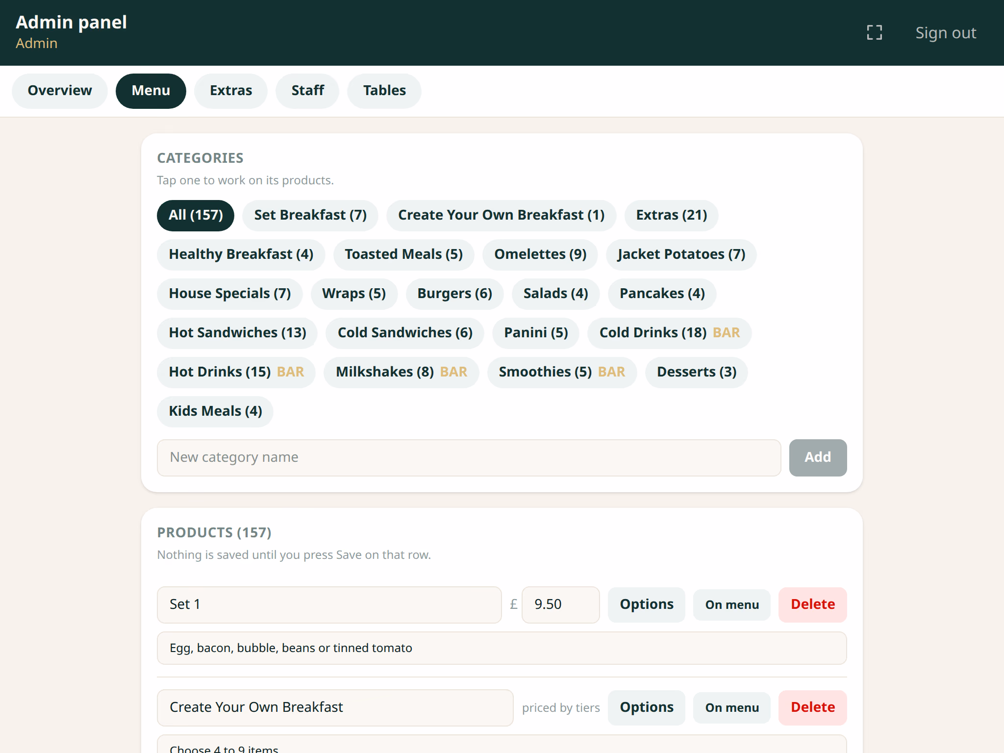 The MasaKasa menu admin screen on a tablet, showing categories and products with their prices ready to edit.